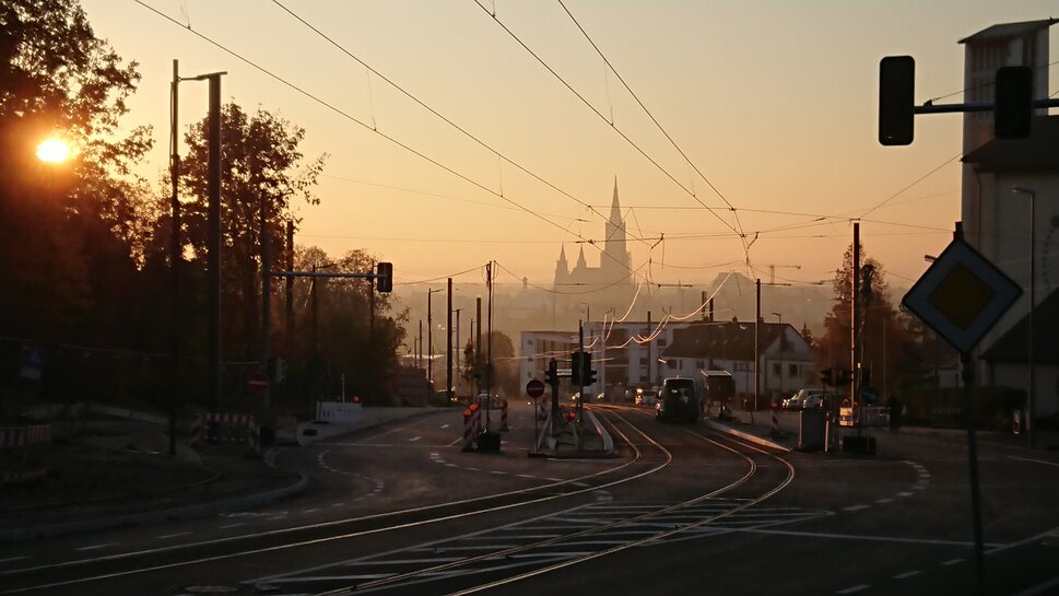 Overhead line system - tramway in Ulm Overhead line infrastructure during sunset in Ulm